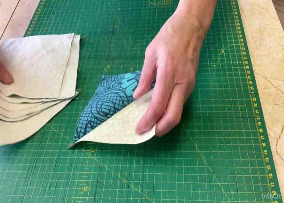 Making the half-square triangles for the patchwork quilt block