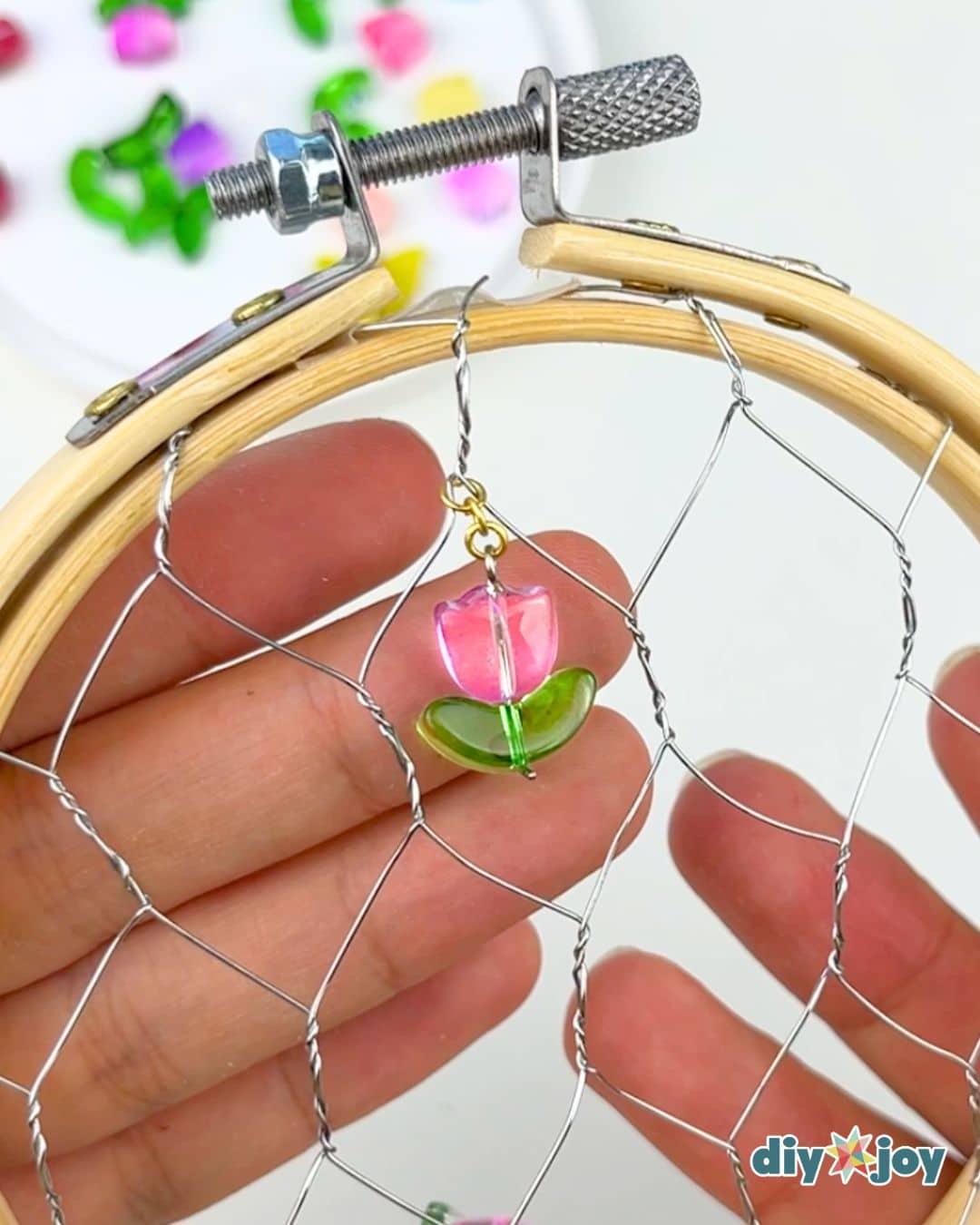 Chicken Wire Suncatcher — hanging the charms