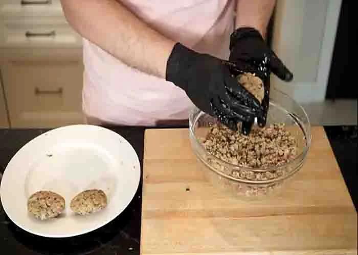 Shaping the tuna mixture into patties