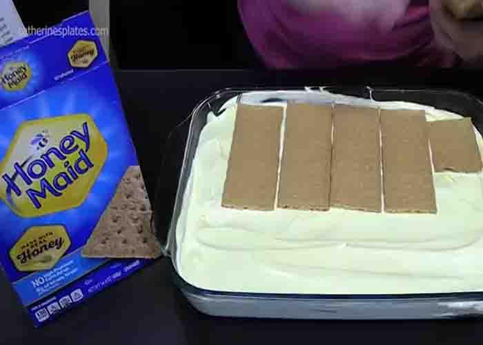 Assembling the no-bake lemon dessert cake