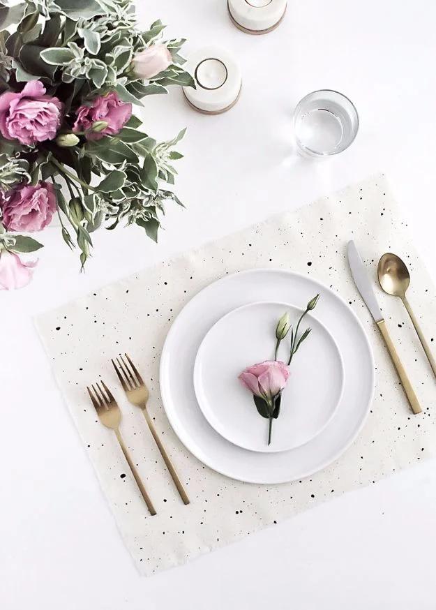 DIY Speckled Placemats, one of the best napkin and placemat ideas on this list and an idea worth saving for later
