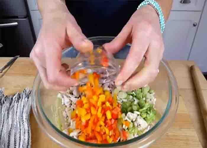 Combining all the avocado chicken salad ingredients
