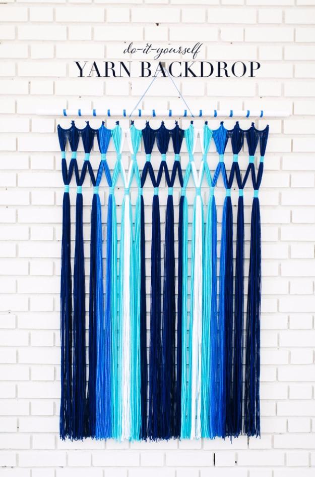 DIY Easy Yarn Backdrop, a colorful way to use up leftover yarn and a cozy handmade piece for the home