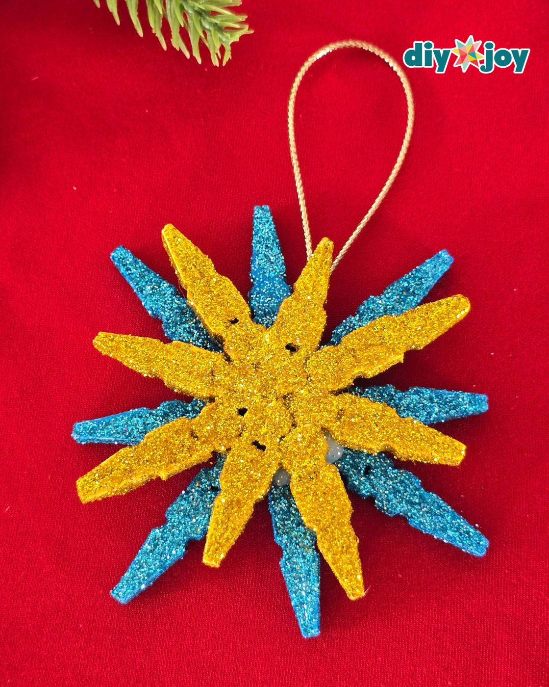 Homemade Christmas Ornaments — diy clothespin snowflake ornament in minutes