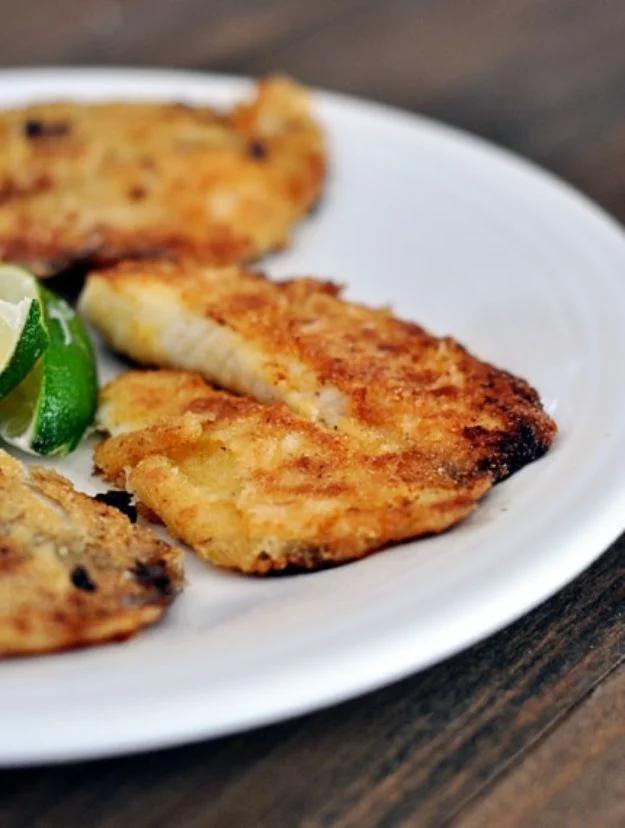 Honey lime tilapia pan fried golden with lime wedges, a sweet and tangy easy fish recipe for weeknights