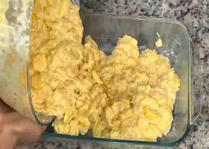 Transferring the squash mixture to the casserole dish