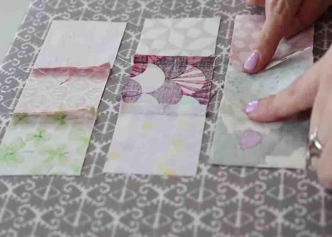 Ironing the seams of the patchworks