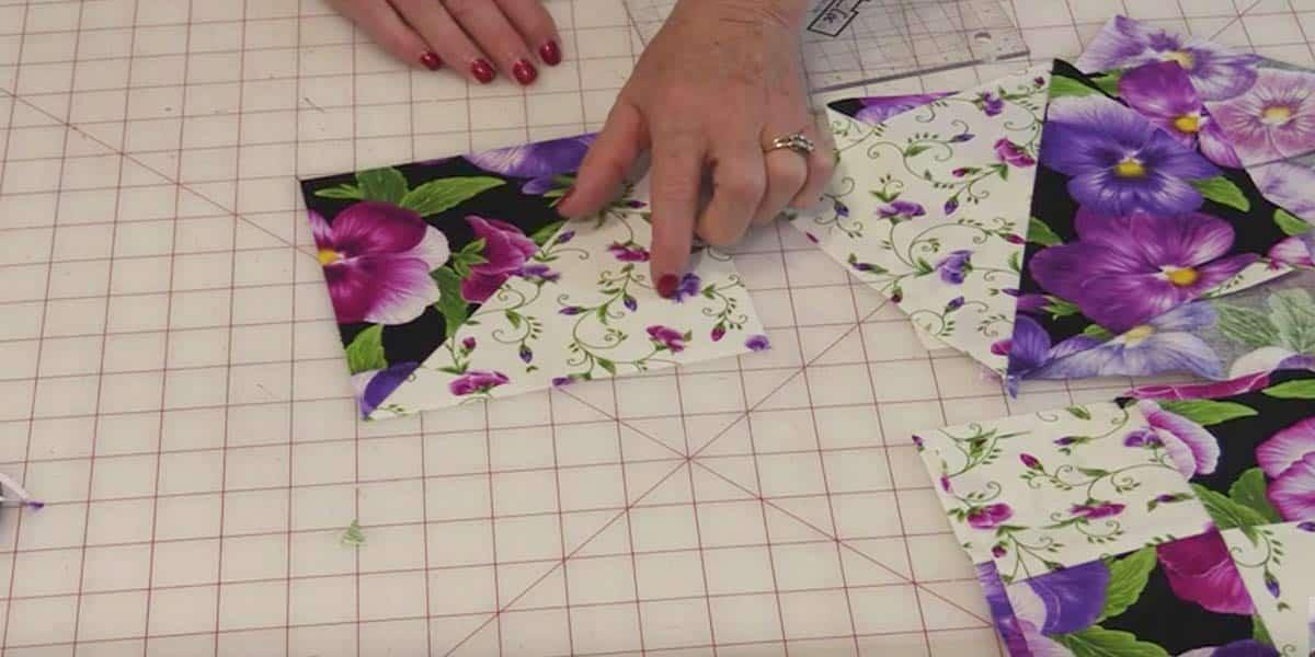 Simply Cut Squares And Long Strips To Make This Simple Pansy Quilt