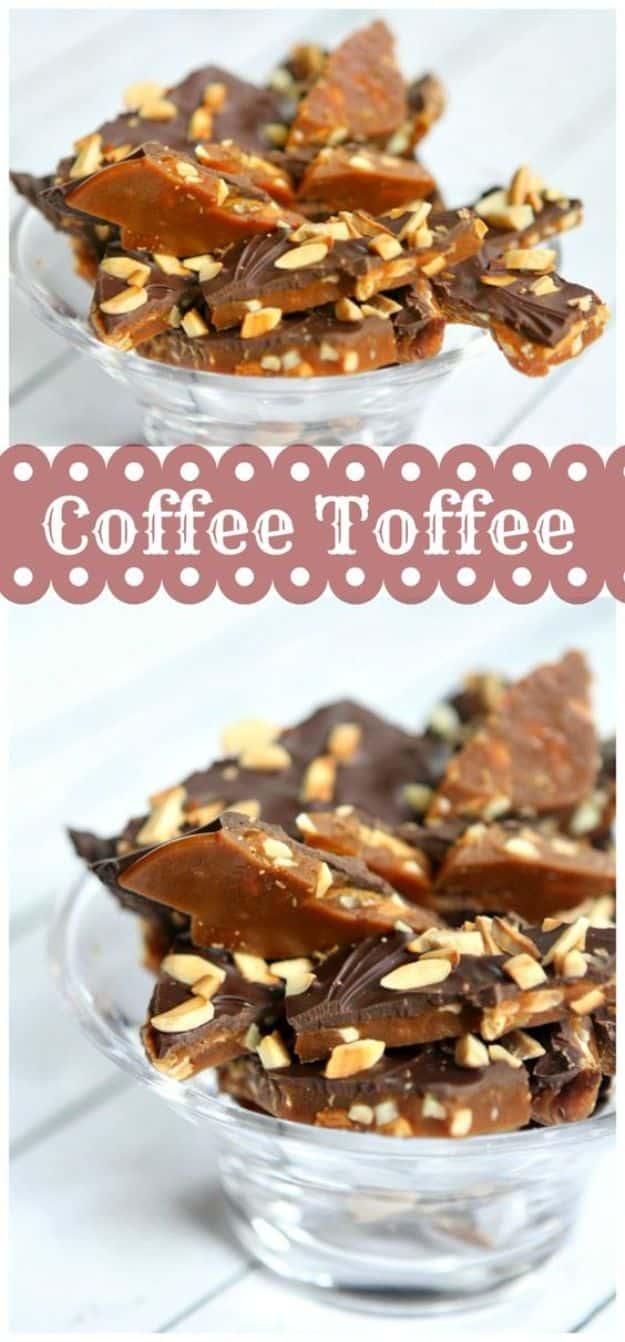 Coffee toffee broken into shards topped with melted chocolate and toasted slivered almonds in a glass dish
