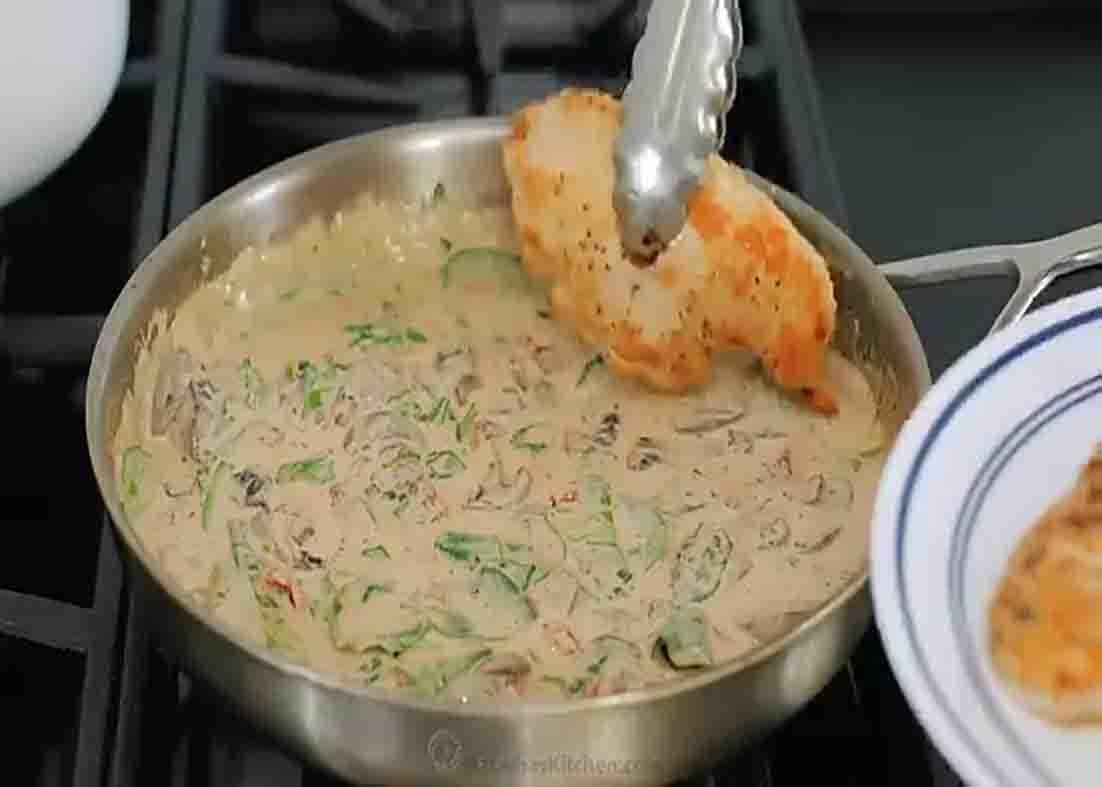 Cooking the tuscan chicken