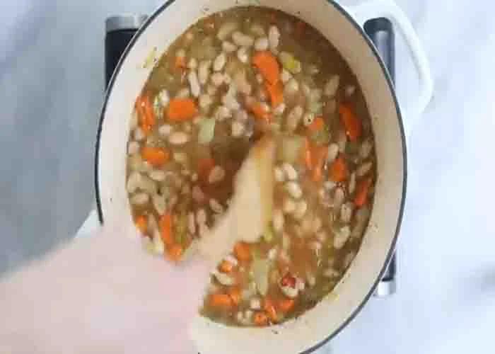 Cooking the Tuscan white bean soup