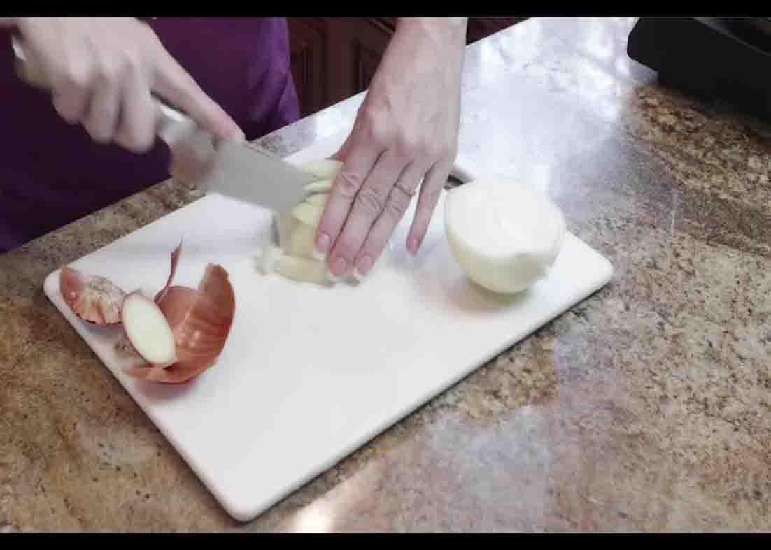 Chopping some onions for the Doritos casserole