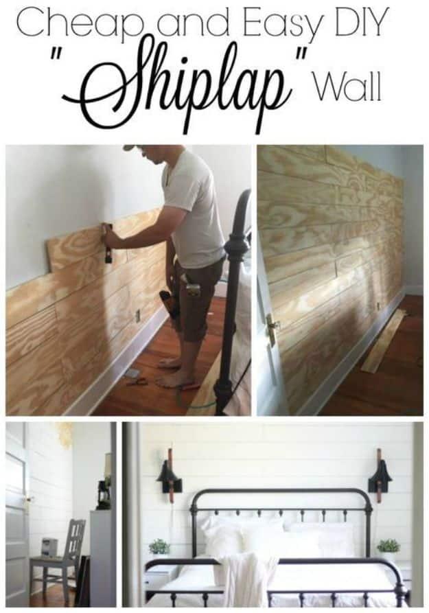 White painted shiplap plank wall behind a black metal bed with white bedding and two black wall sconces