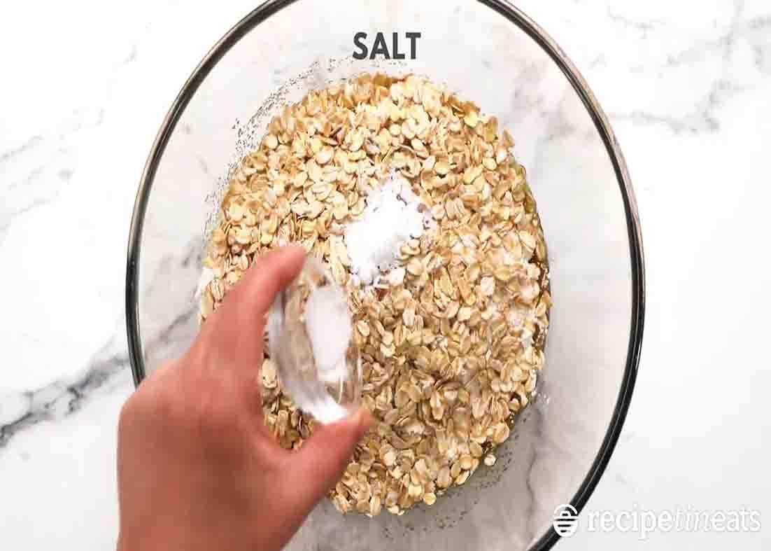 Combining all the ingredients for the raspberry jam oat bars recipe