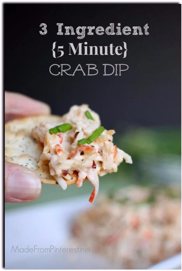 Warm three ingredient crab dip in a baking dish served with crackers, an easy five minute party appetizer