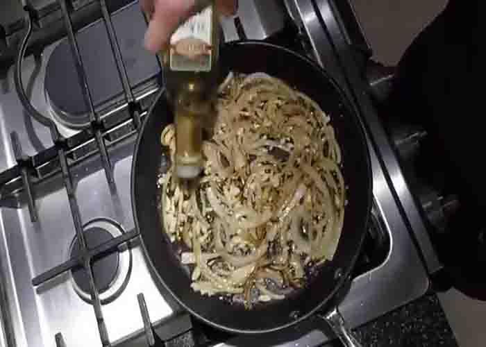 Sauteing the onions for the brussels sprouts and bacon recipe