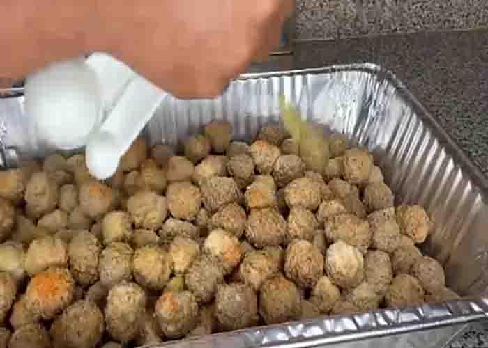 Seasoning the meatballs