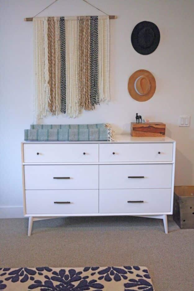 DIY Boho Yarn Wall Art, quick enough to finish over a weekend and a clever way to reuse scraps you already have
