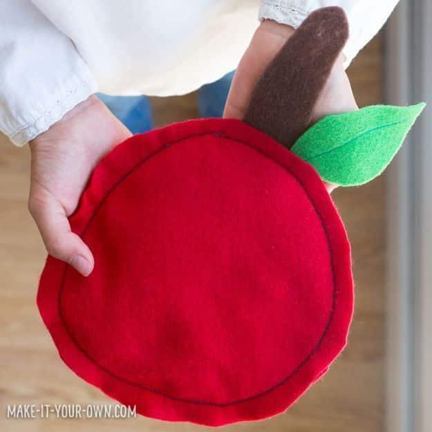 DIY apple craft with homemade harvest project and apple-season decorating idea, showing the finished big apple bean bags