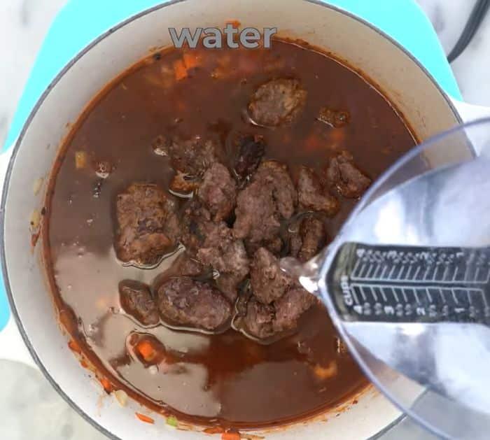 Pouring water into a pot