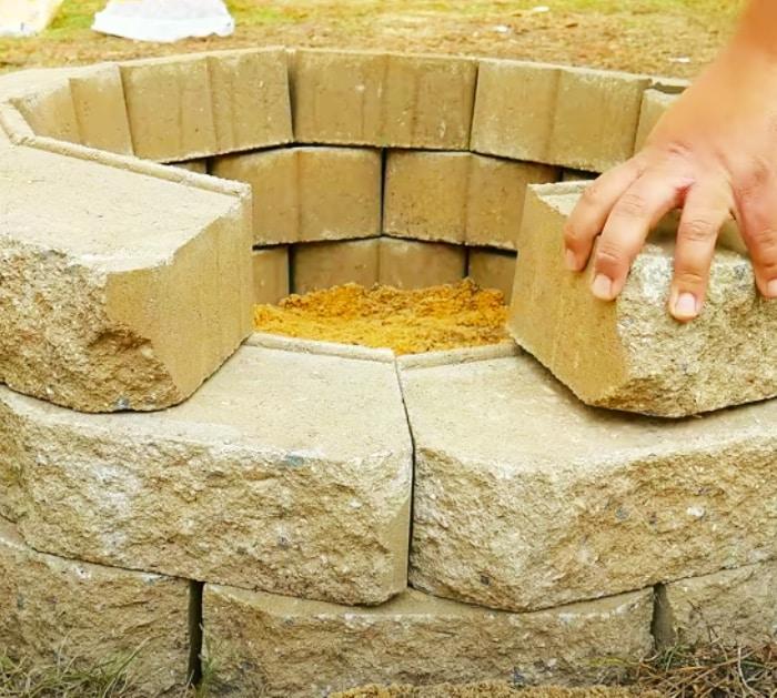 Stack Retaining Wall Stones To Make A DIY Fire Pit