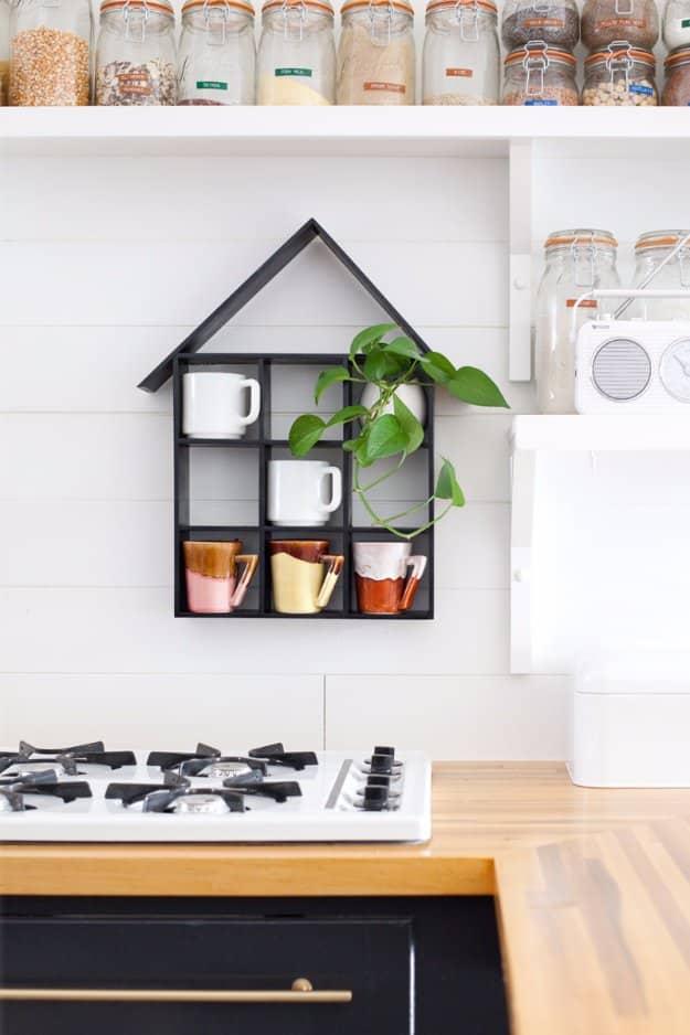 House Shaped Shelf DIY, a popular choice on this list and a simple DIY that brightens up a plain kitchen