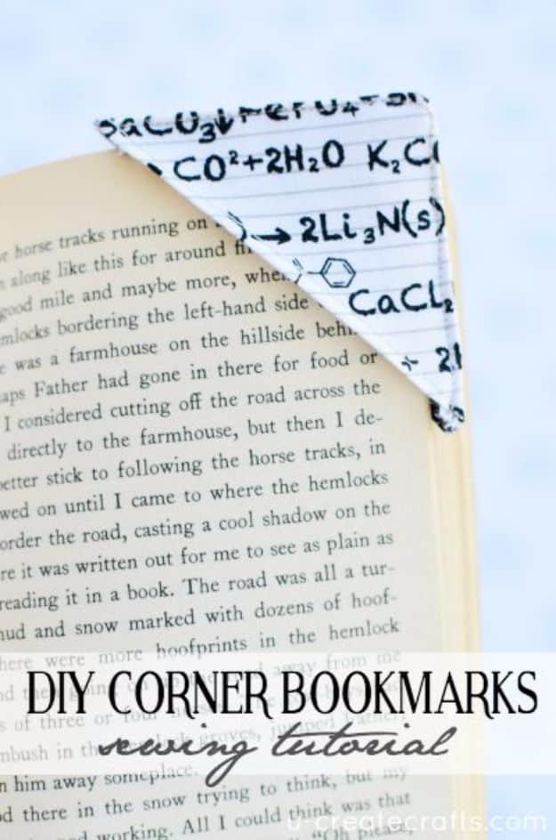 Quilting scraps corner bookmark in a science equation print slipped over the corner of an open book page