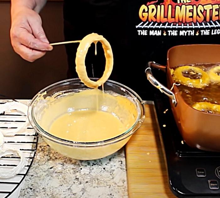 Dip Onions In Homemade Beer Batter For Deep Fred Onion Rings
