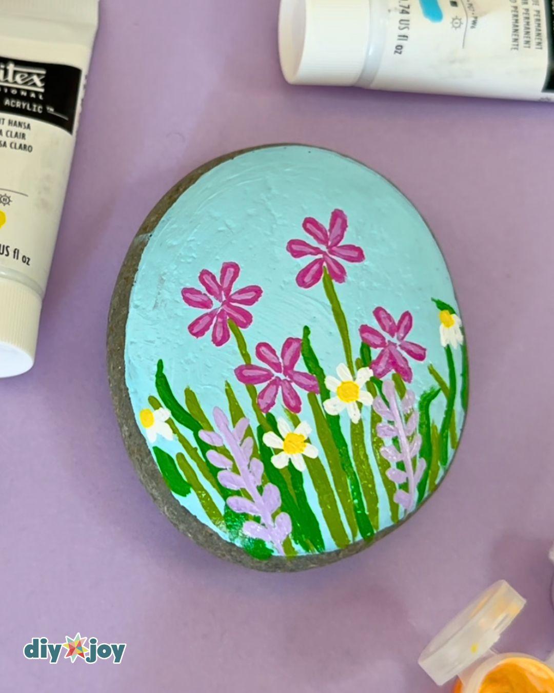 Flowers On Rocks — how to paint flowers on rocks