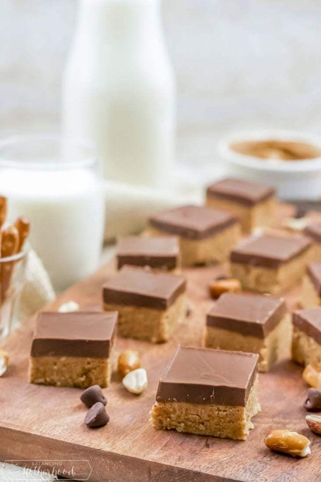 No bake peanut butter bars made with a pretzel crust and a milk chocolate peanut butter topping, an easy no bake dessert