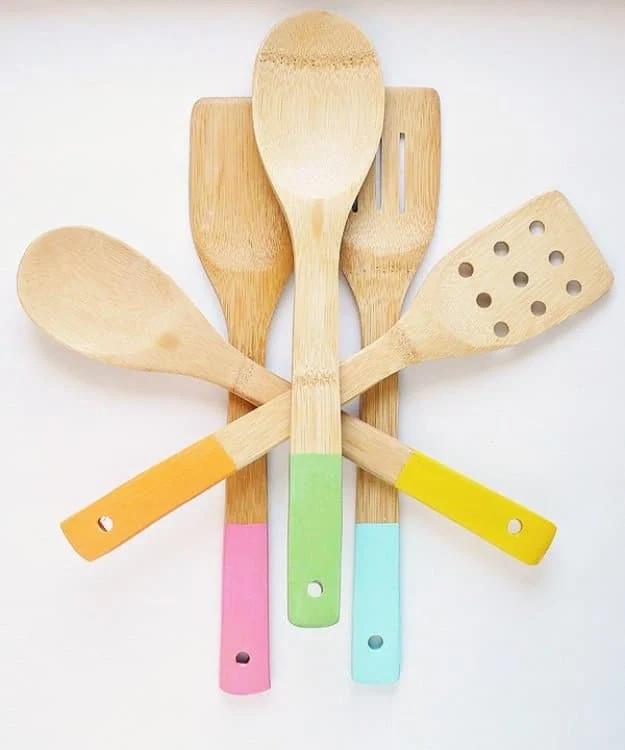 Color Dipped Wood Kitchen Utensils, a creative kitchen decor idea worth making this weekend and a popular choice on this list