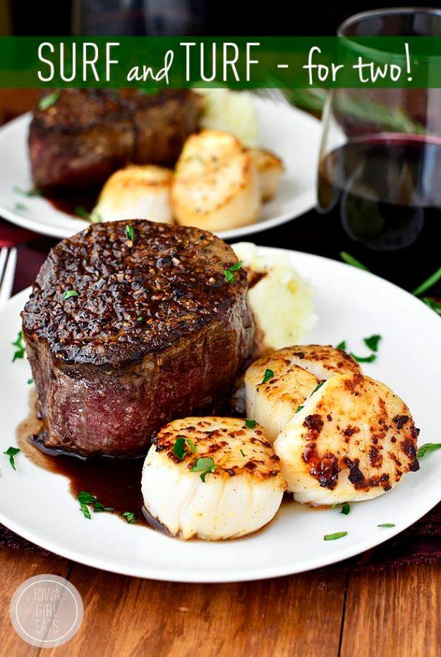 Surf and turf for two with seared scallops and filet mignon plated together under a rosemary wine pan sauce