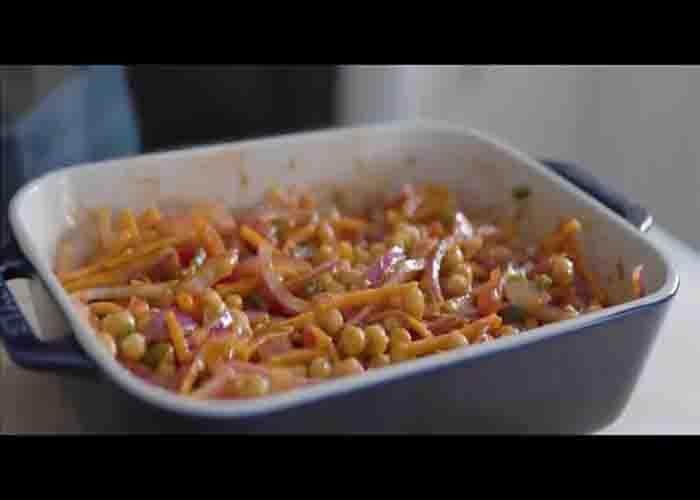 Mixing all the baked chickpea ingredients together