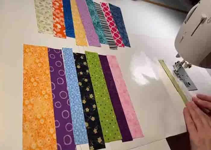 Sewing the scrap fabrics together to make the block
