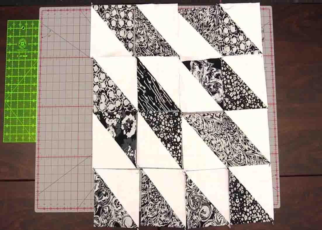 Laying the blocks together to make the starburst quilt