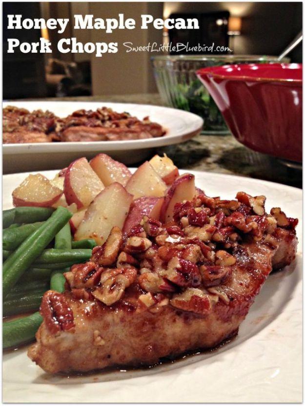 Honey maple pecan pork chop topped with a glossy pecan sauce, served with green beans and red potatoes