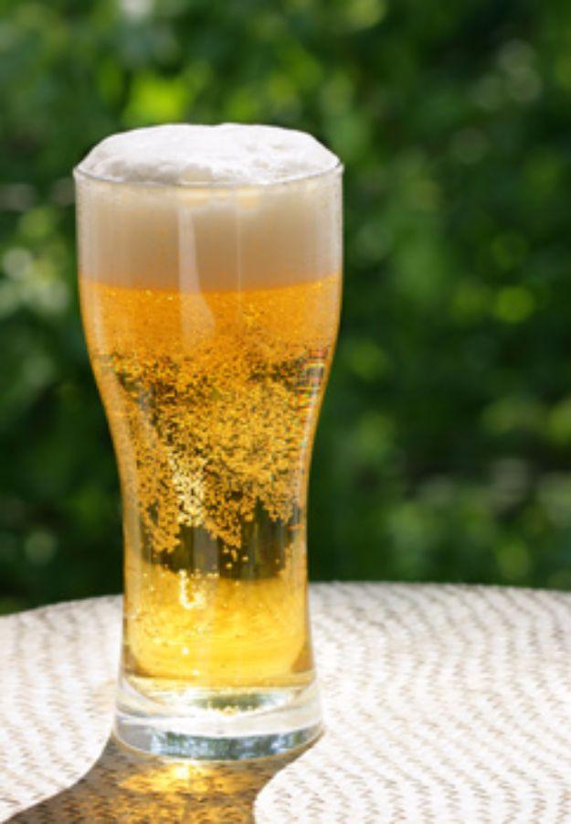 Summer ale in a pint glass, pale straw colored and clear with condensation running down the side on a hot afternoon