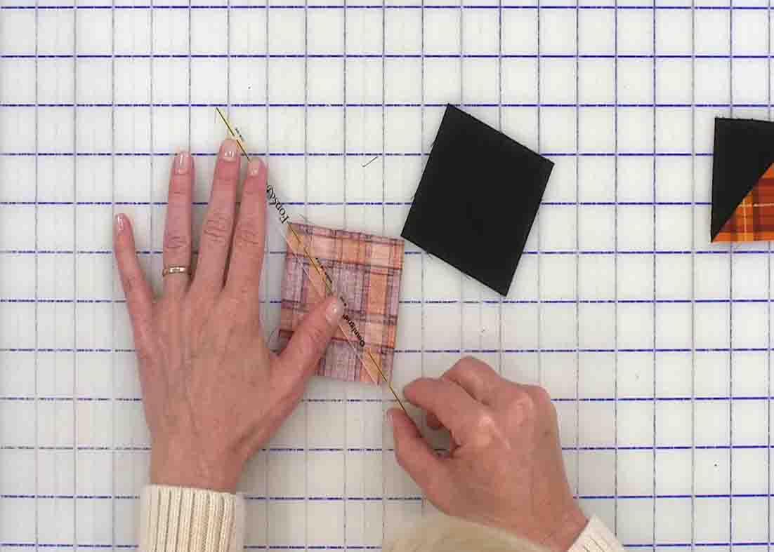 Lining up the half-square fabric