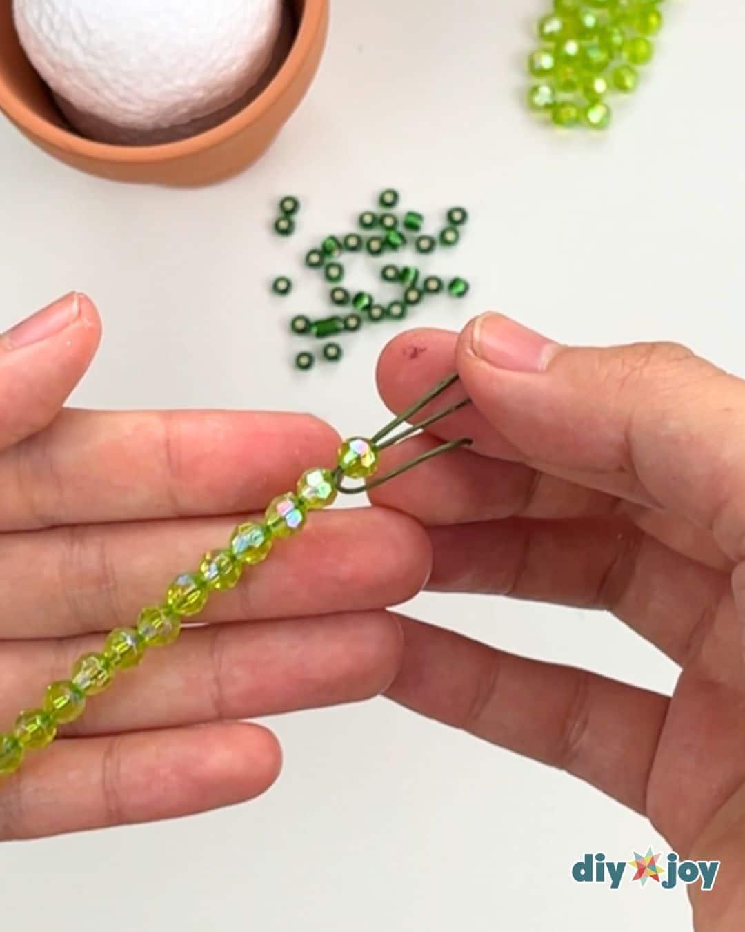 Homemade Tiny Beaded Vine Desk Plant — locking the beads