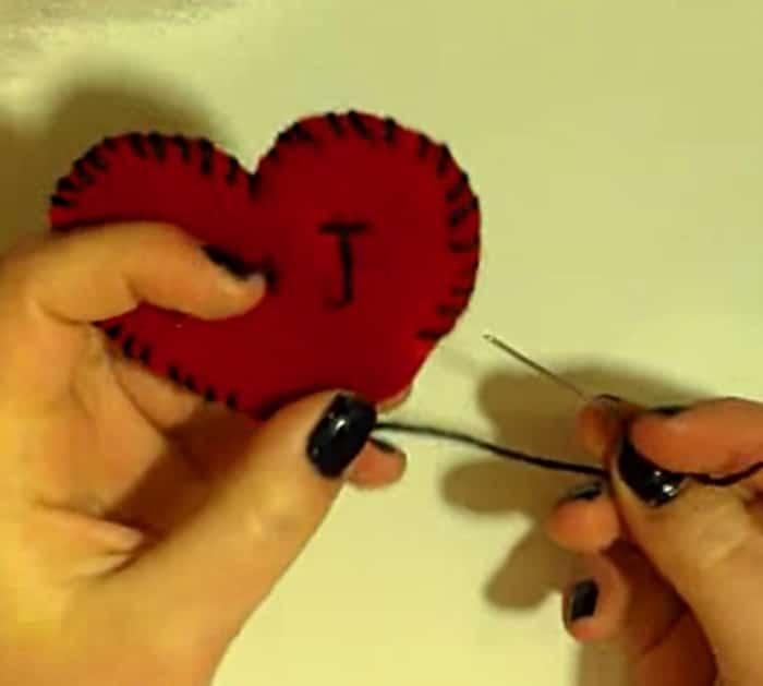 Learn to make these quick easy Valentine Felt Hearts that look like the old school Valentine's Day Candy
