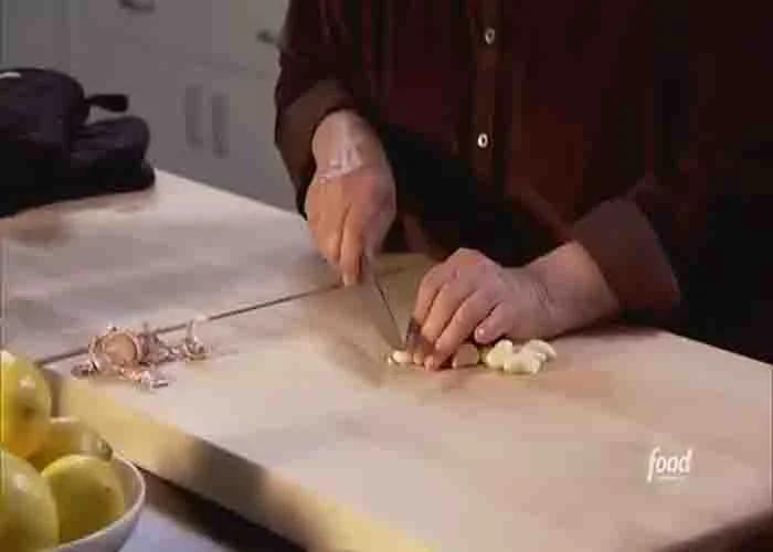 Slicing the garlic for the aglio olio recipe