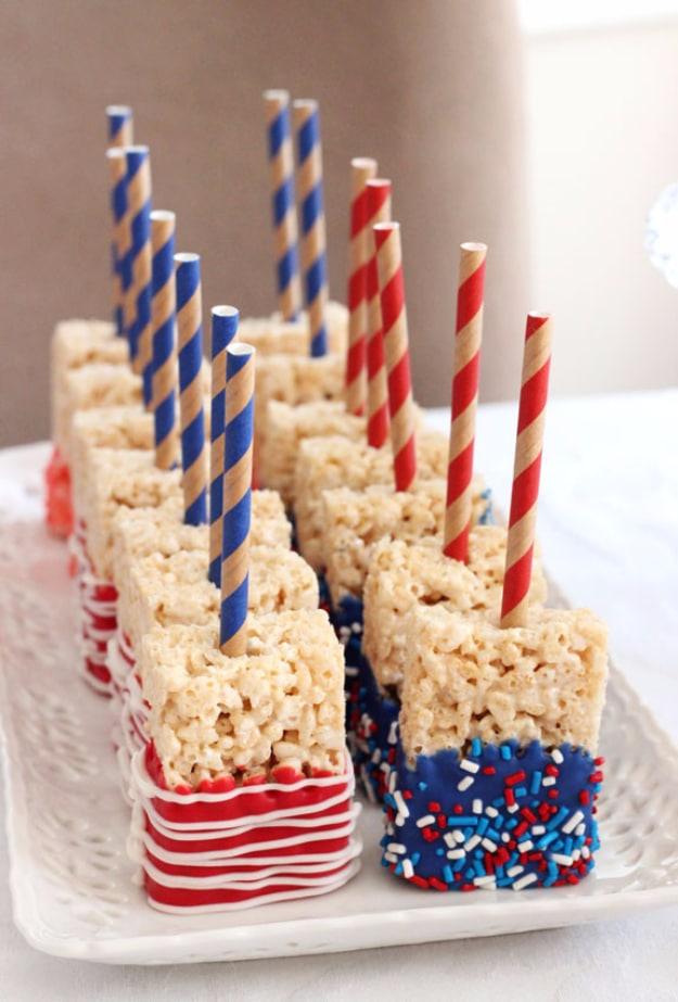 Red and blue Rice Krispies treats decorated by kids on the patio for a hands on Fourth of July dessert