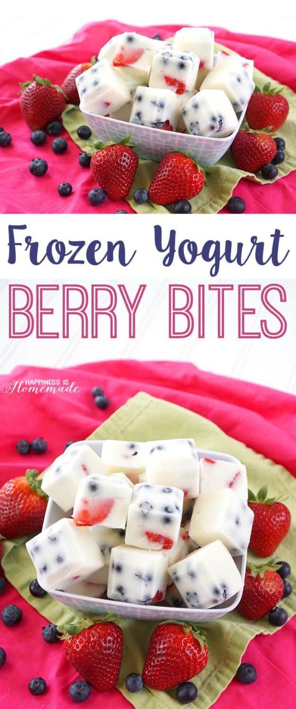 Frozen yogurt berry bites made in a silicone mold with strawberries and blueberries in Greek yogurt for a healthy snack
