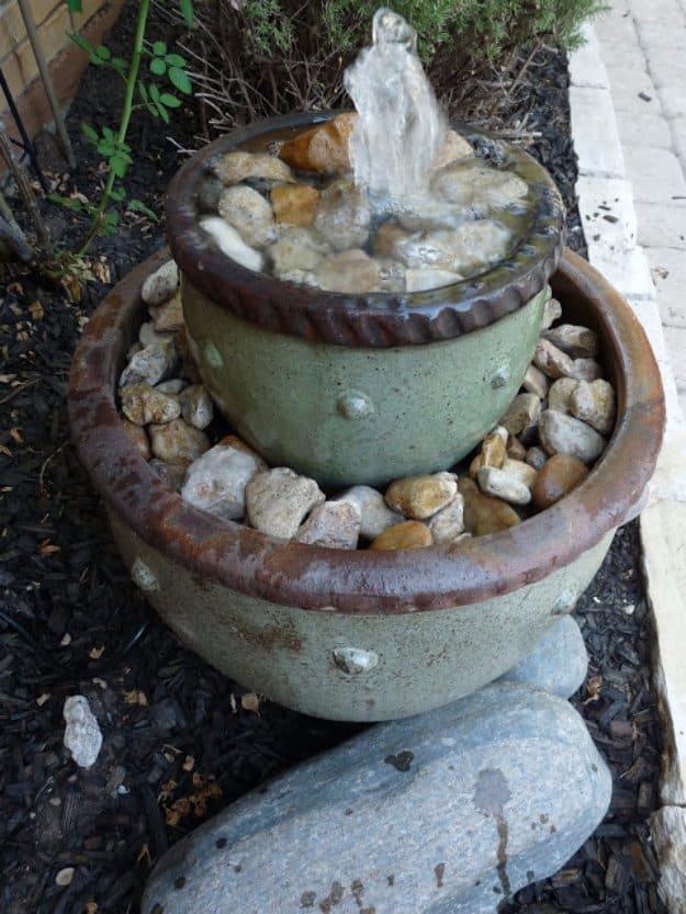 DIY Flower Pot Fountain, a fun DIY garden idea worth trying this season and a creative touch for a porch or garden path