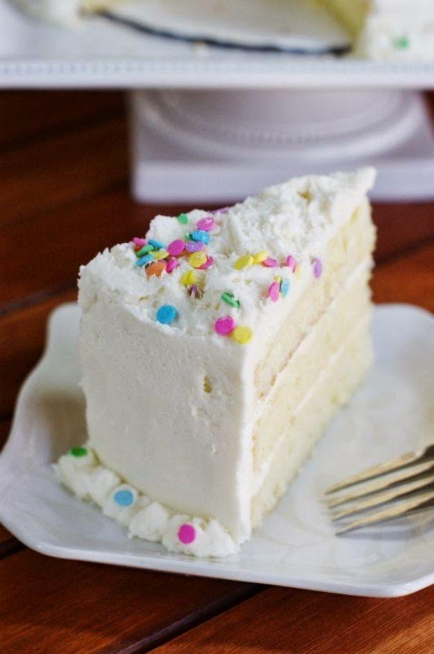 White chocolate birthday cake with creamy white frosting and sprinkles, an elegant celebration bake recipe for a celebration