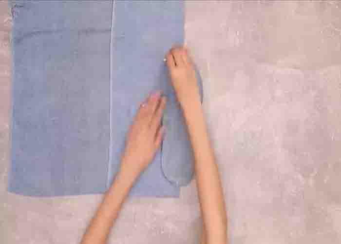 Making the DIY slippers using an old towel