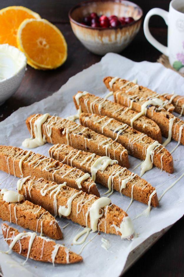 Cranberry orange biscotti dipped in white chocolate with chopped dried cranberries, a gluten free cookie