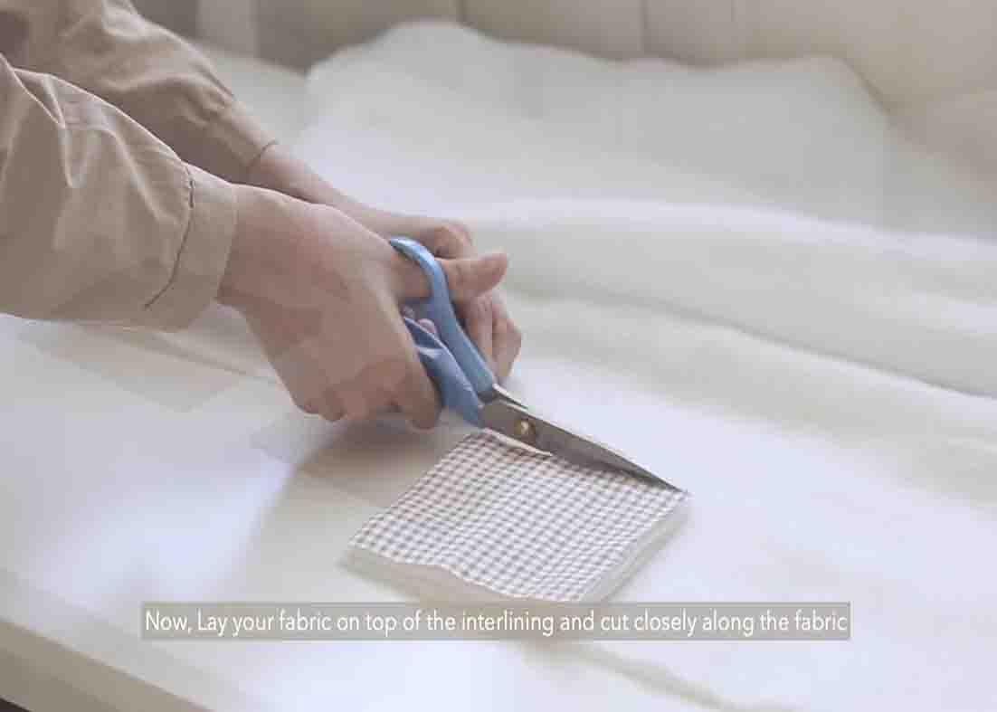 Cutting the fabric and the cotton interlining for the fabric coaster