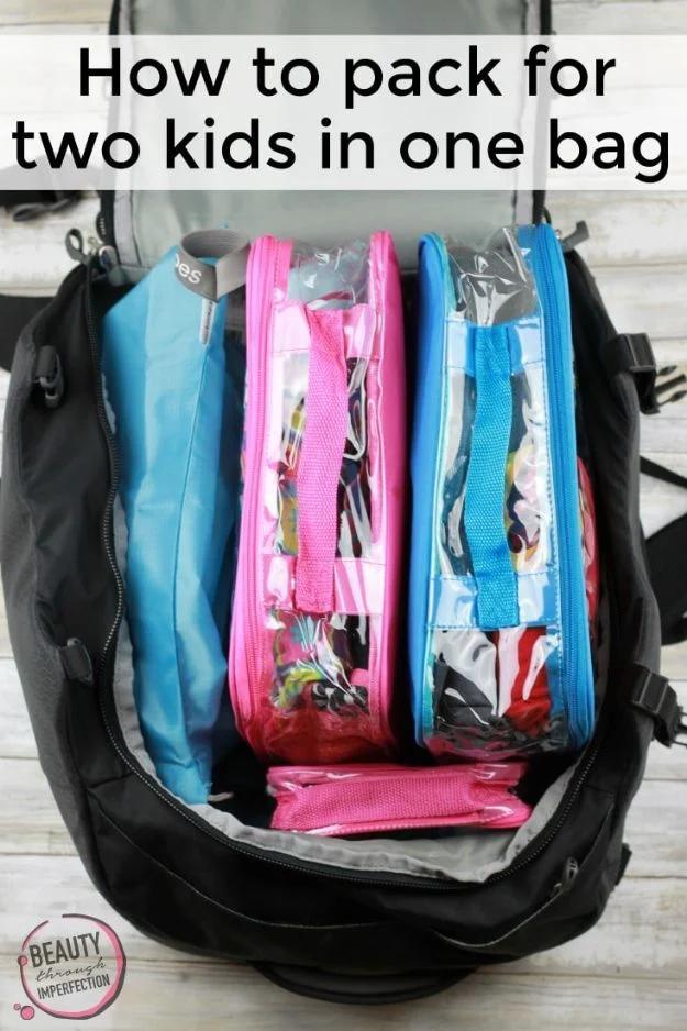 Graphic reading How to pack for two kids in one bag over a black duffel holding blue and pink packing cubes