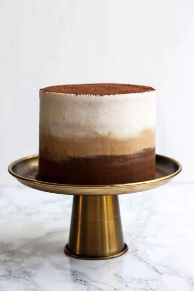 Tiramisu layer cake with coffee soaked layers, mascarpone frosting and a dusting of cocoa powder recipe for a celebration